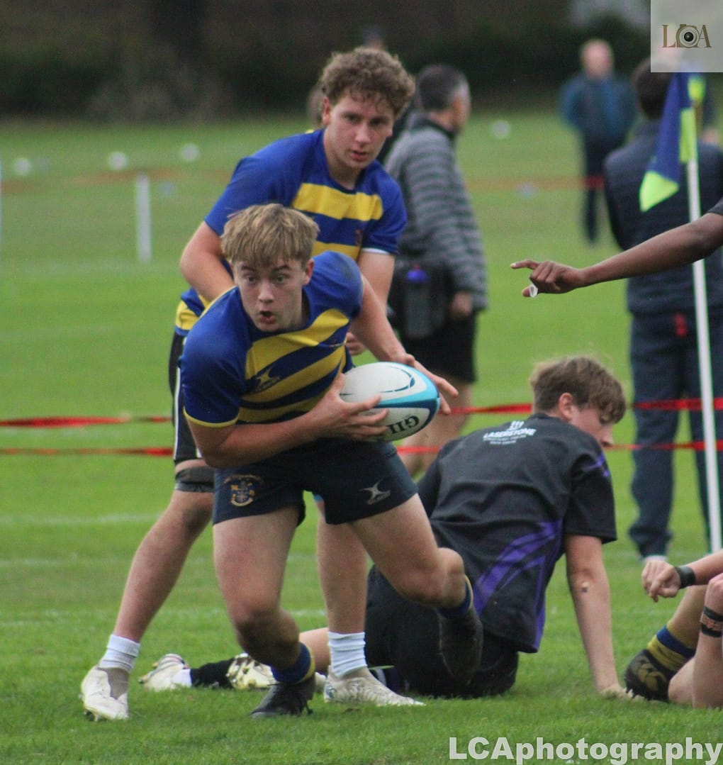 A Rugby player with a ball in Chislehurst