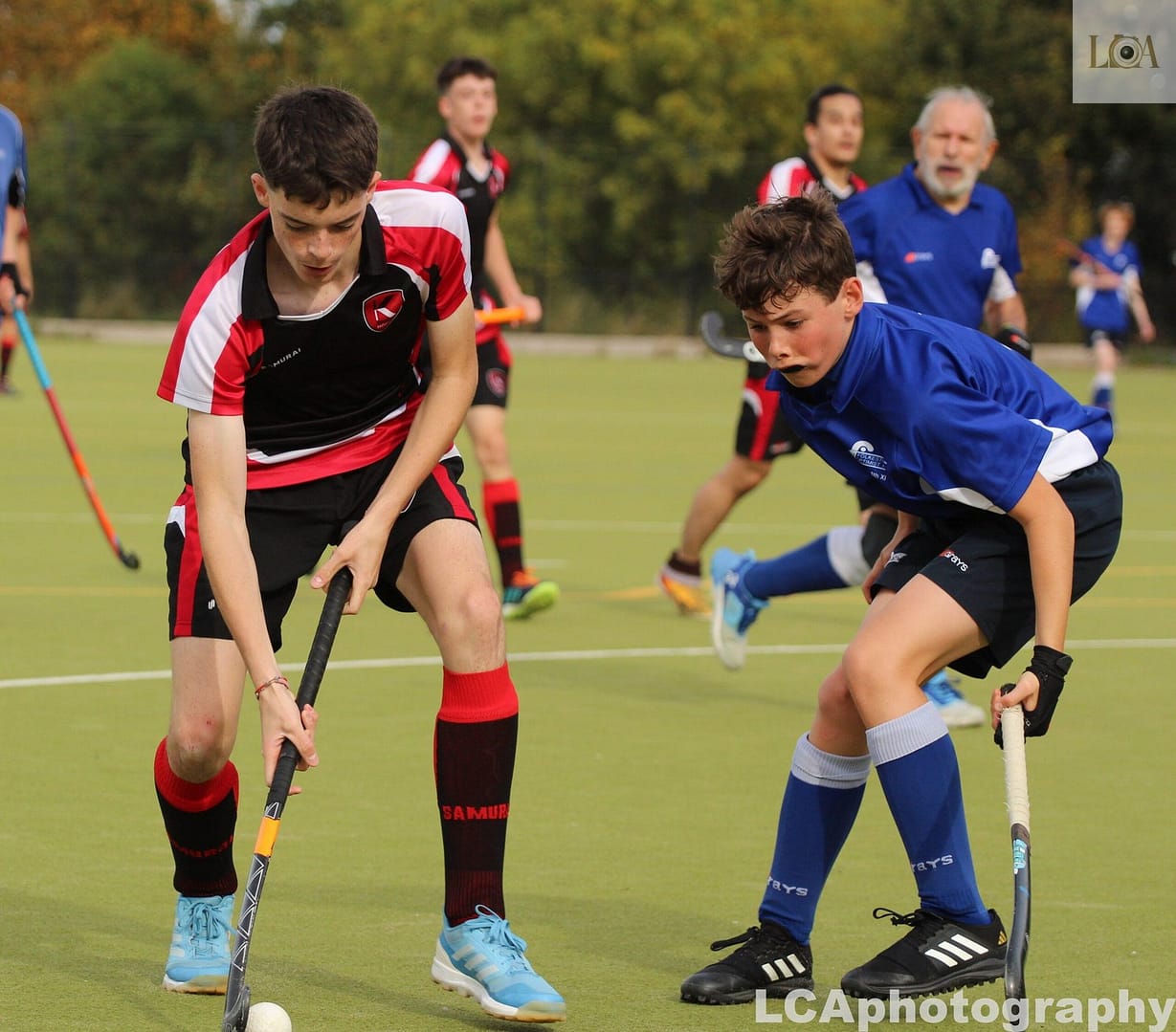 K Sport hockey player playing a game vs Folkestone