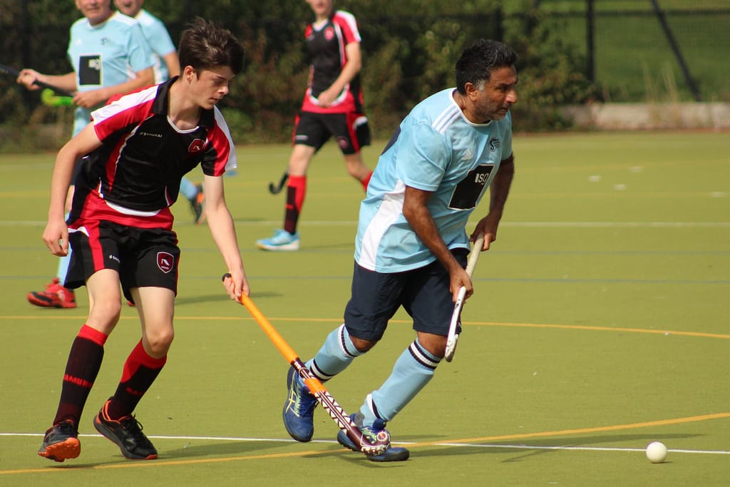 Hockey players in a match in Rochester, Kent