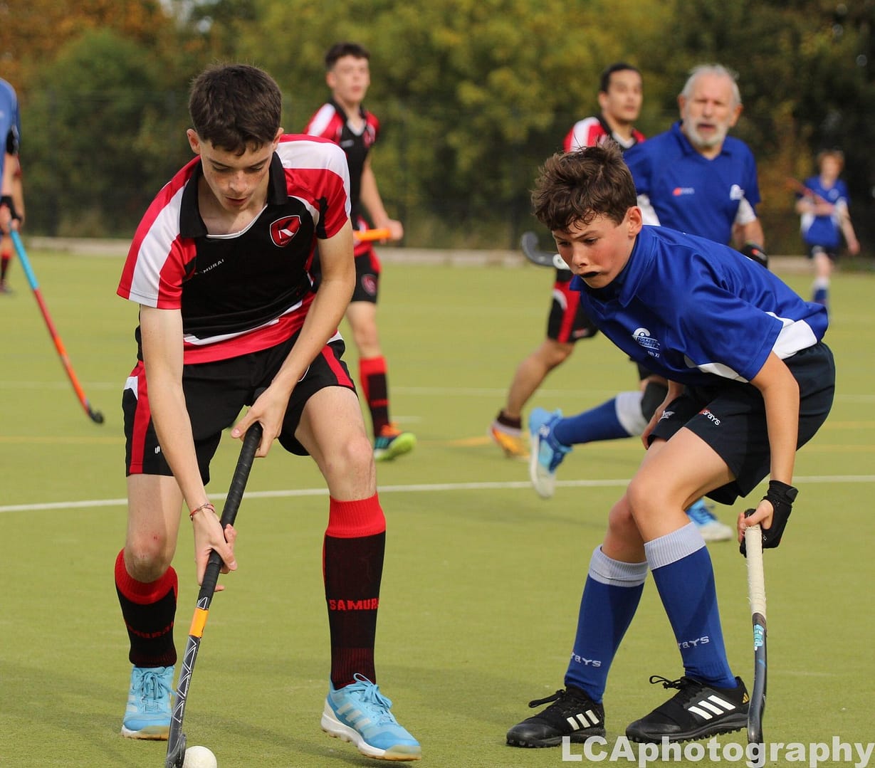 K Sport hockey player playing a game vs Folkestone