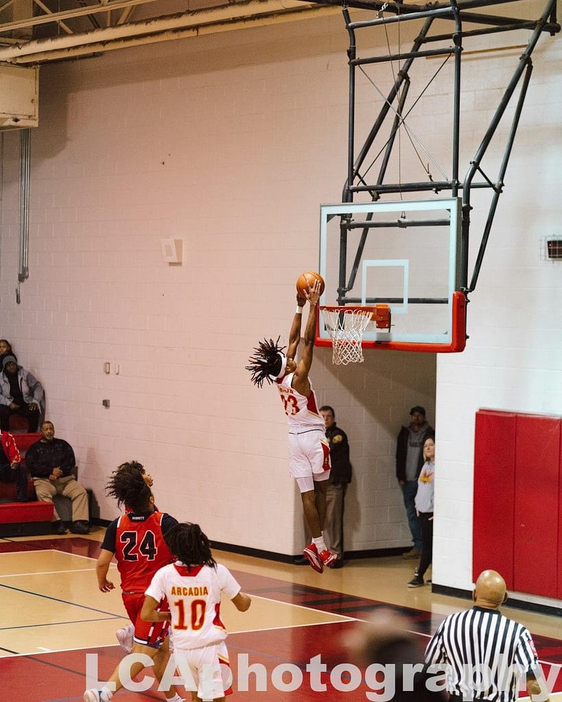High School player soars for a dunk